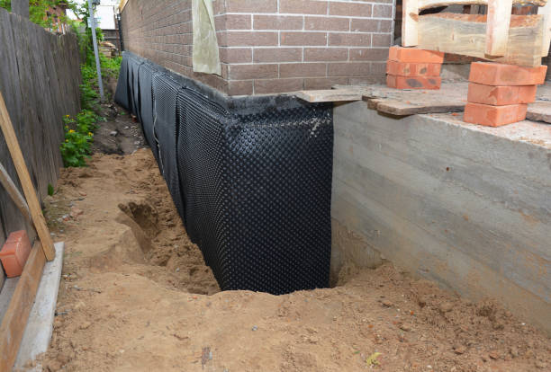 SJ Waterproofing Pros technician performing targeted Vapor Barrier Installation assessment in Mountain, WI